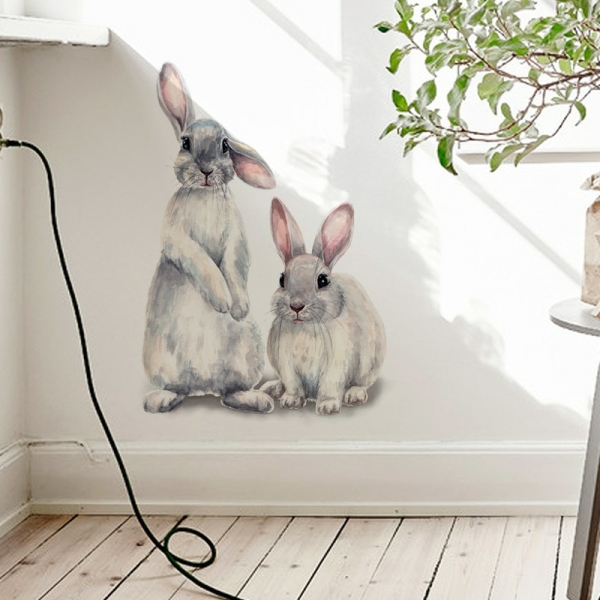 Väggdekoration av två söta kaniner för flickor med vit bakgrund