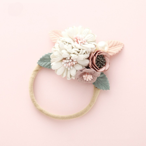 Elastiskt blommigt pannband för flickor img Bandeau elastique a fleurs pour fillette 01