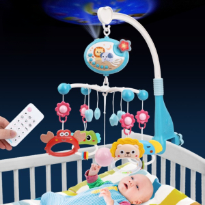 Musikmobil för barnsäng med mörkblå bakgrund och baby i barnsäng